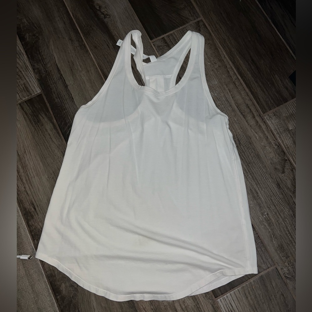 White Lululemon racerback tank top. No tags but it has never been worn.